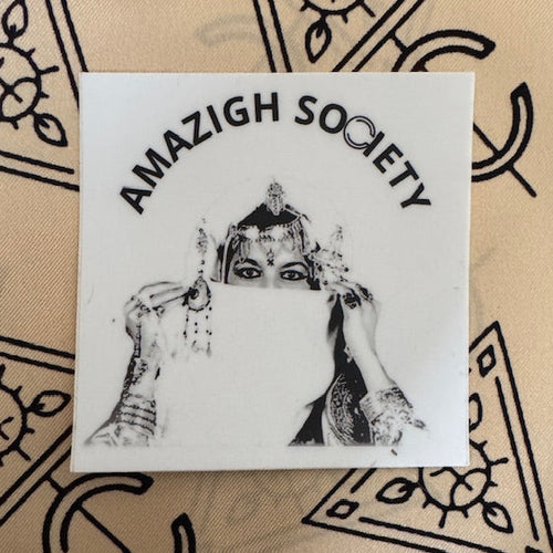 Sticker with 'Amazigh Society' text on a patterned background